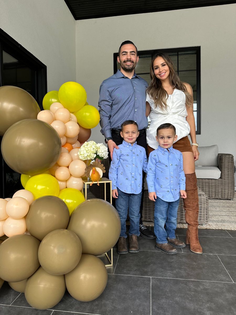 Mark, Tatiana and the boys dressed up for a family holiday