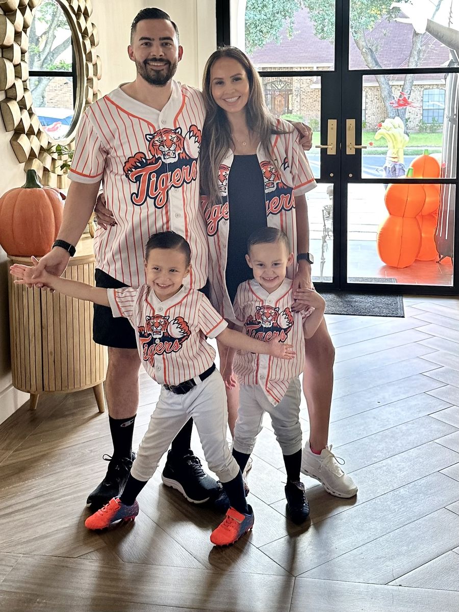 The Hanna family at home in matching Tigers baseball jerseys